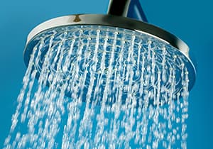 a stream of water running from a shower head