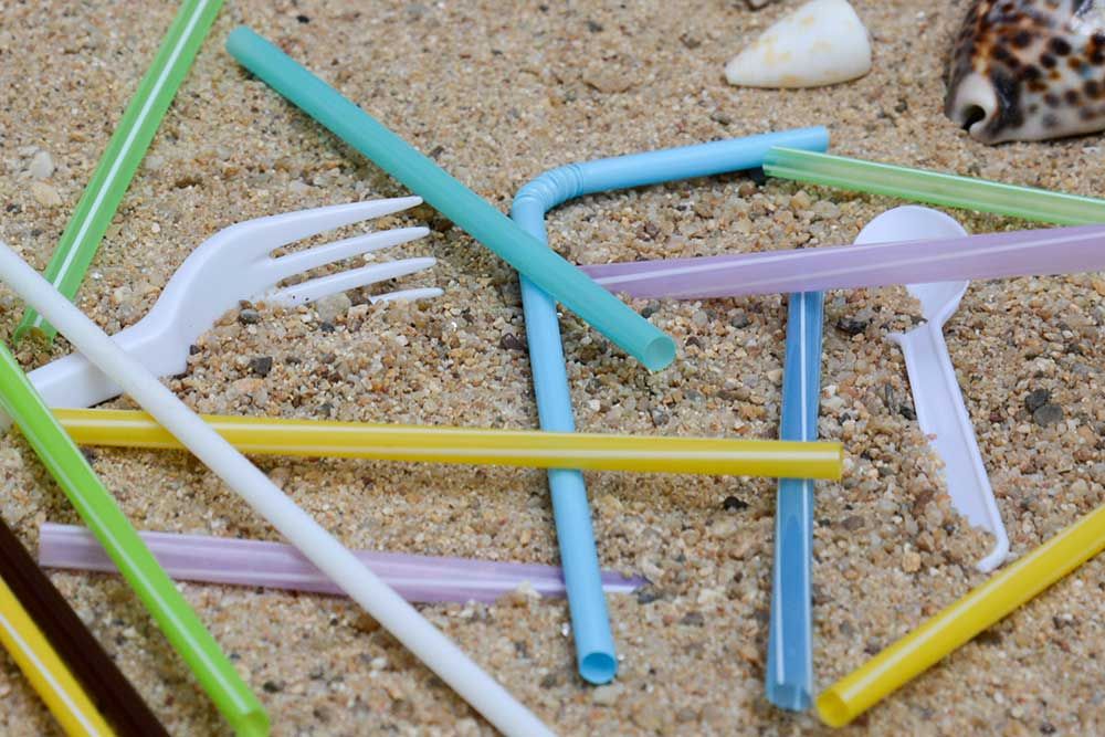 Straws abandoned on the beach