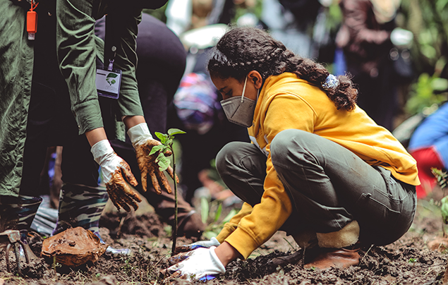 How to save the planet | Young girl plants tree