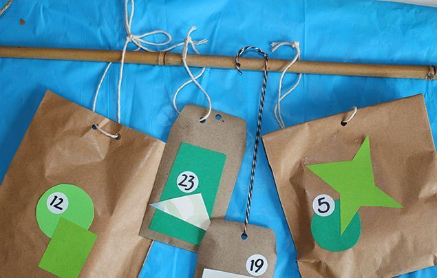how to make an advent calendar | tie the bags onto the branch