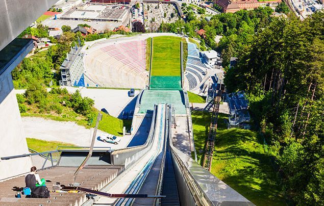 winter olympics facts | a dry ski jumping slope in the sunshine