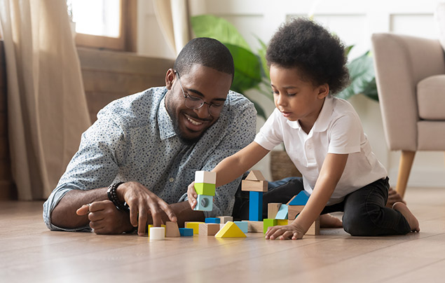 screentime for kids: a father and son play with wooden blocks