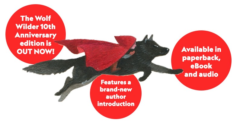 Ilustration of a girl in a red hooded cloak riding a wolf. Text reads: The Wolf Winder 10th Anniversary edition is OUT NOW! Available in paperback, eBook and audio. Features a brand-new author introduction